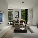 3D render of the living room villa AK with view to the dining area and a large television on the wall