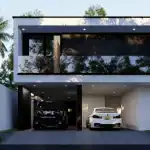 Exterior view of a modern MVIVO villa illustrating luxury home construction in Sri Lanka, featuring a three car carport and an overhanging upper floor.