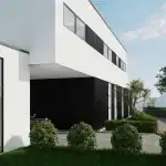 Luxury house design in Sri Lanka showing the main entrance, with the upper floor subtly overhanging to create depth and shade.